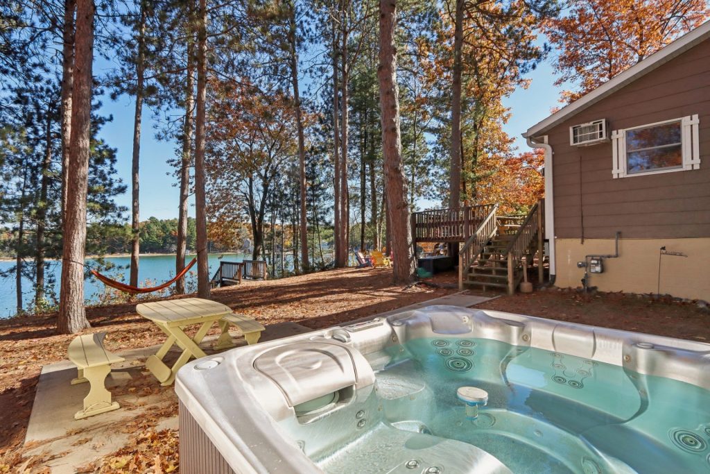 Adventure Cottage is only FEET from the shores of Sand Bay in Door County. 101 feet of frontage awaits for swimming and we include the kayaks, fishing gear, yard games, and bonfire pits!